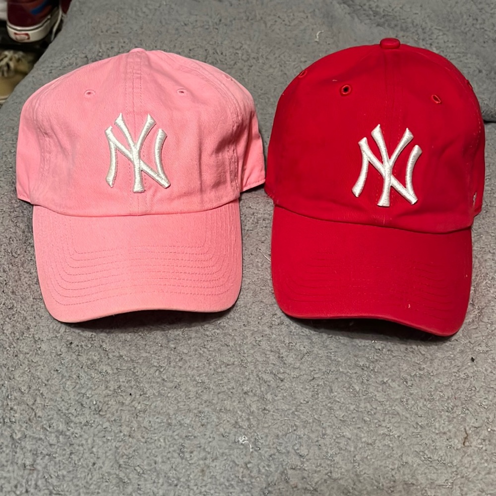Two Yankees hats